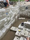 Bouw zwemvijver kleine tuin Assen